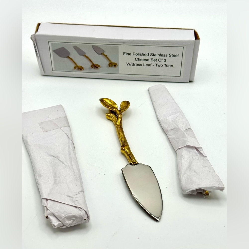 New Polished Stainless Steel
Cheese Knives Set Of 3
W/Brass Leaf - Two Tone.